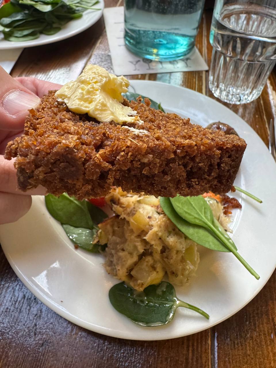 Traditional geothermal-baked Icelandic rye bread (rúgbrauð) with butter tasted on a Reykjavik Food Tours food tour with our agency